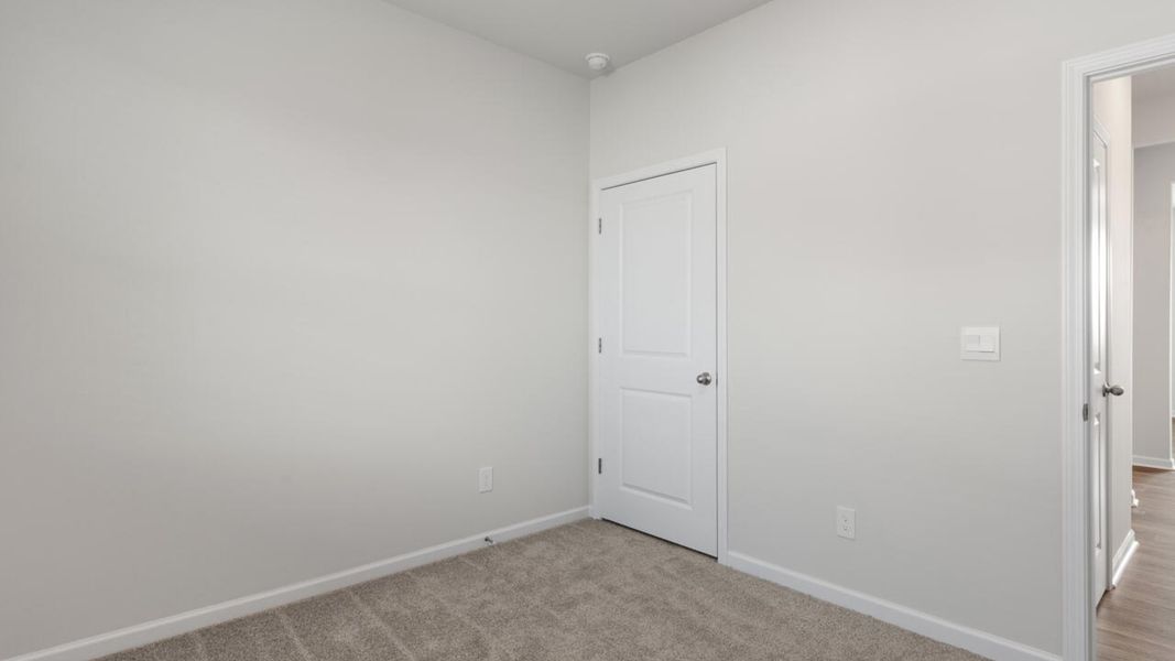 Spacious, unfurnished interior of a new home in Indigo Preserve, Leland (Image 25).