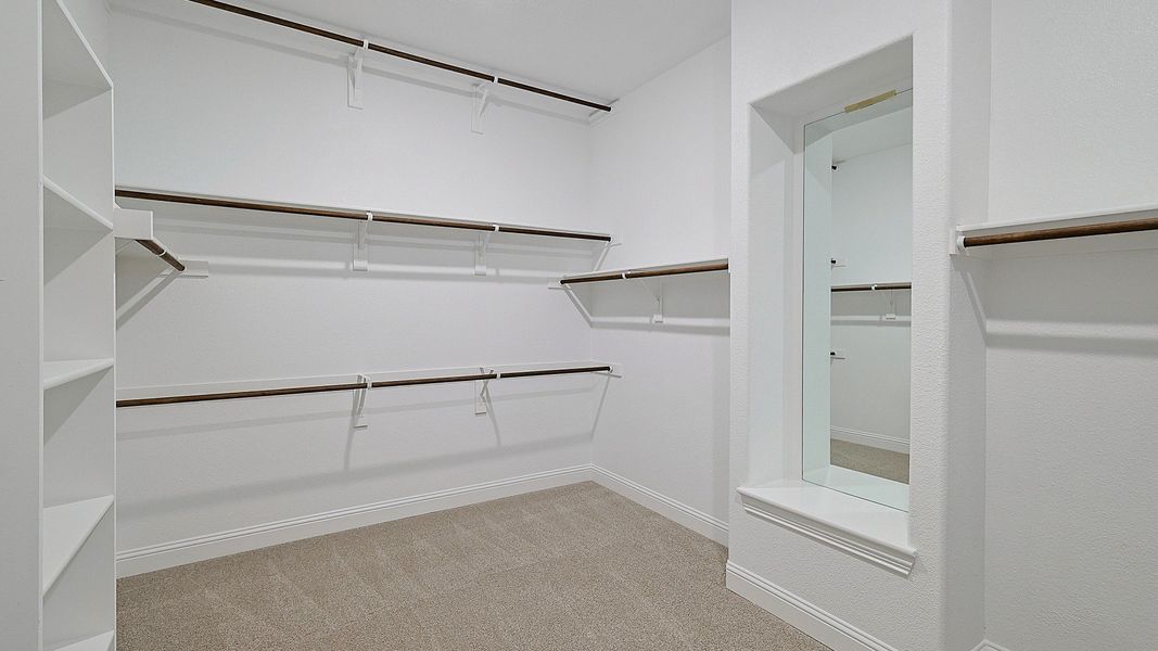 Representative furnished interior of a home built from the Villanova by Brightland Homes in Katy Lakes, Katy (Image 13).