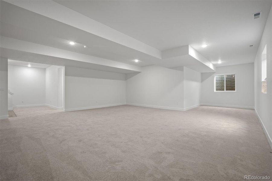 Spacious, unfurnished interior of a new home in Wolf Ranch - Enclave Collection, Colorado Springs (Image 34).