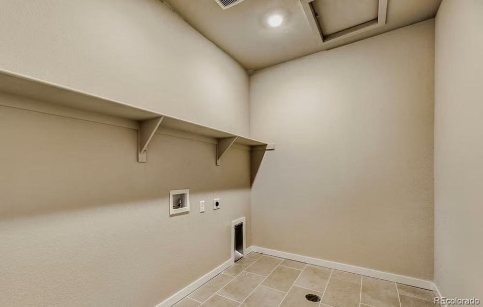 Sierra A - Laundry Room - Picture not of actual home