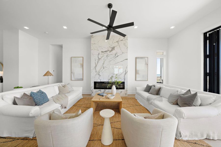 The Family Room boasts an impressive 33 ft wide span with a beautifully designed fireplace. The Family Room boasts an impressive 33 ft wide span with a beautifully designed fireplace.
