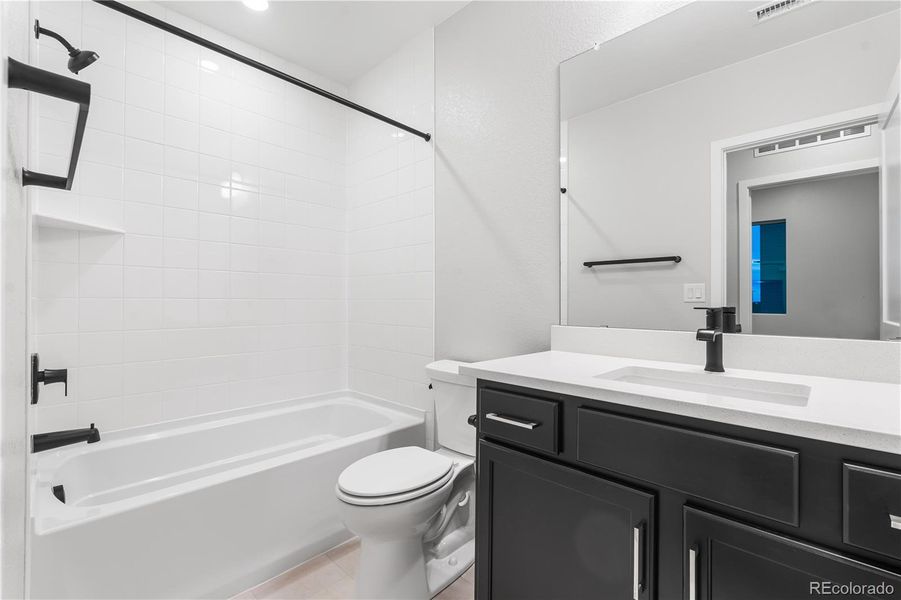 Furnished interior view inside a new home in Tribute at Lyric, Lone Tree (Image 6).