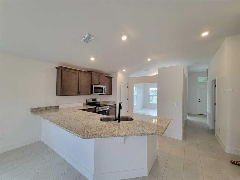 Furnished interior view inside a new home in Ocala Crossings South, Ocala (Image 13).
