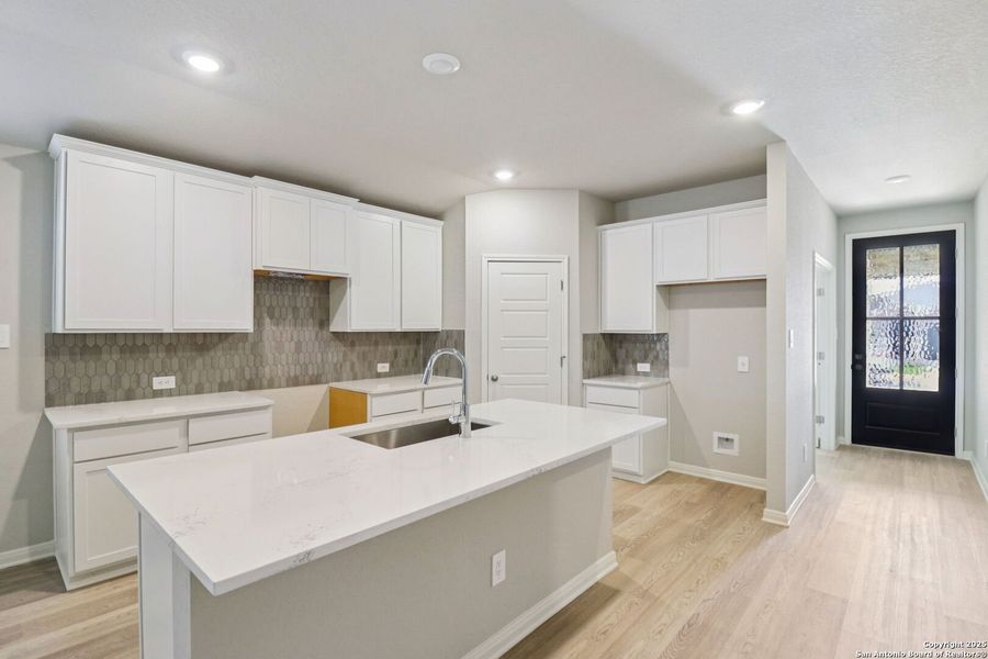 Furnished interior view inside a new home in Estancia Ranch - Premier Series, San Antonio (Image 10).