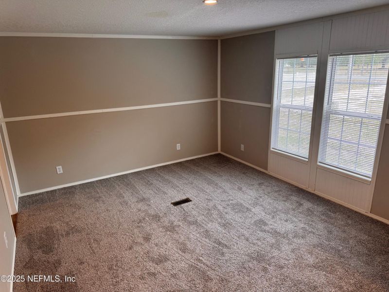 Spacious, unfurnished interior of a new home in , Fernandina Beach (Image 13).