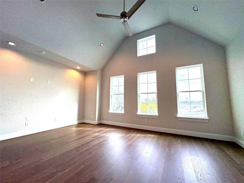 LARGE primary bedroom with high ceilings and tons of natural light!
