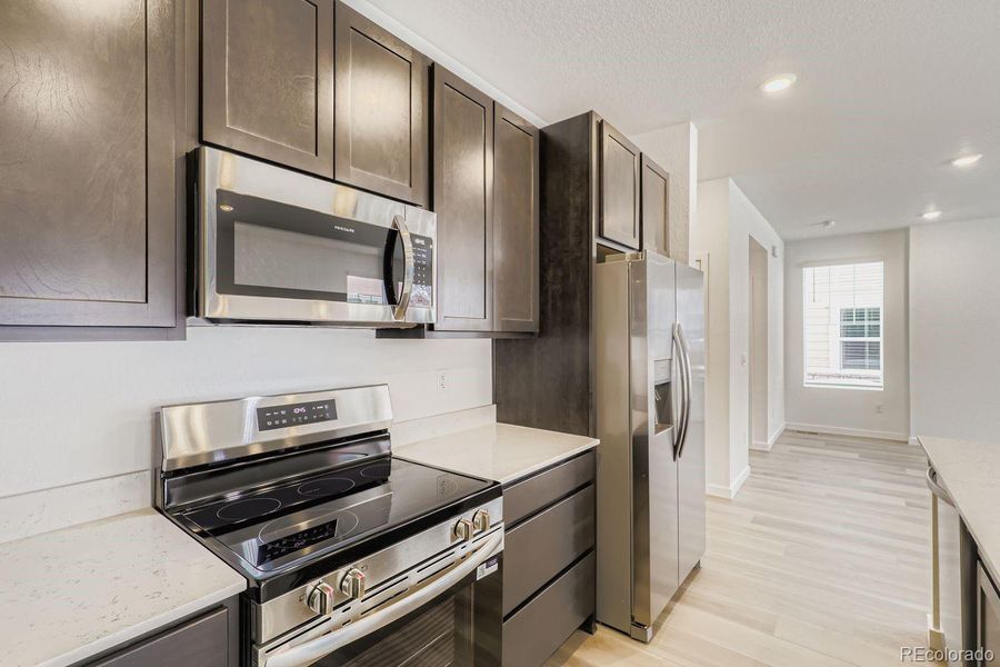 Furnished interior view inside a new home in , Thornton (Image 9).