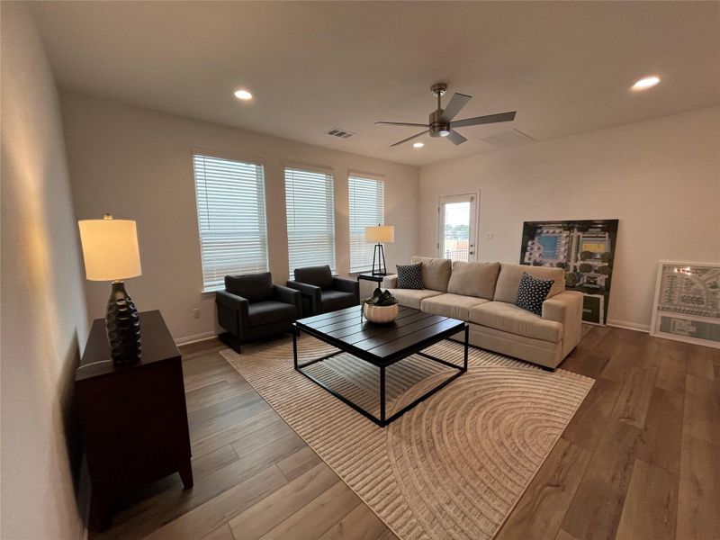 Furnished interior view inside a new home in Wellspring, Round Rock (Image 6).
