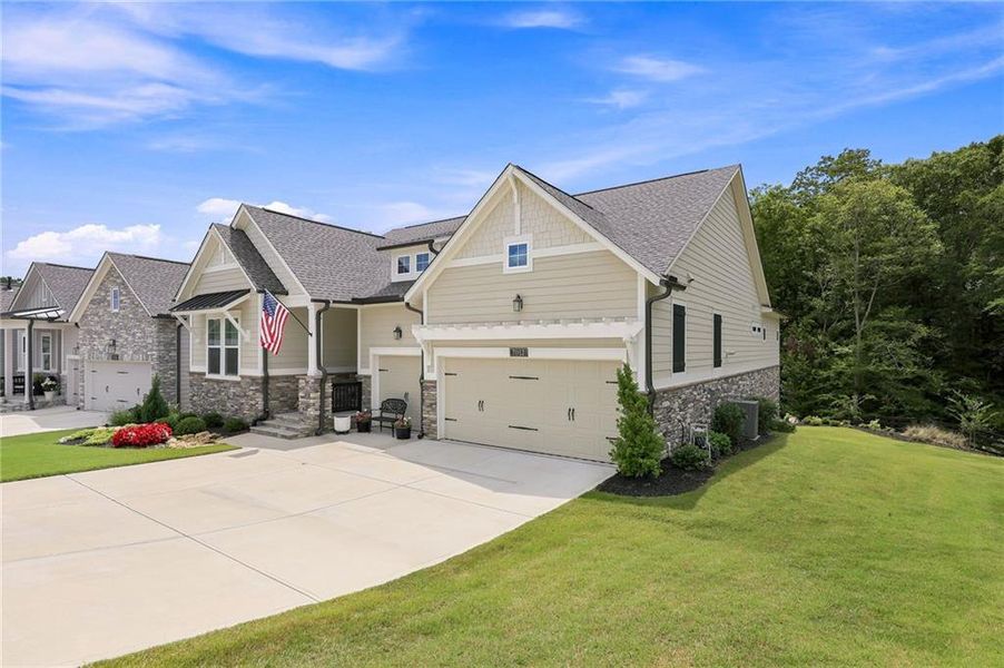 Front exterior of a new home in , Flowery Branch, GA, highlighting curb appeal (Image 20). Front exterior of a new home in , Flowery Branch, GA, highlighting curb appeal (Image 20).