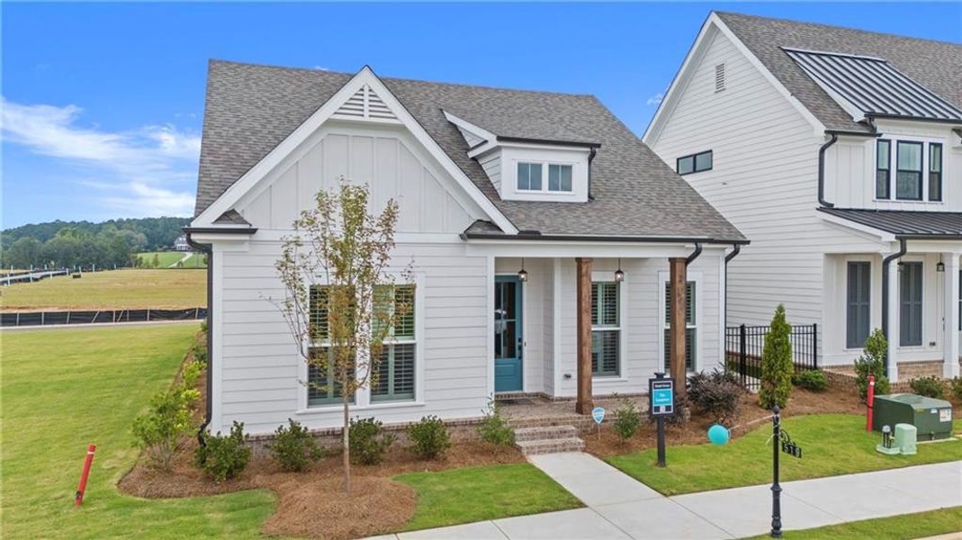Front exterior of a new home in Aberdeen, Hoschton, GA, highlighting curb appeal (Image 21). Front exterior of a new home in Aberdeen, Hoschton, GA, highlighting curb appeal (Image 21).