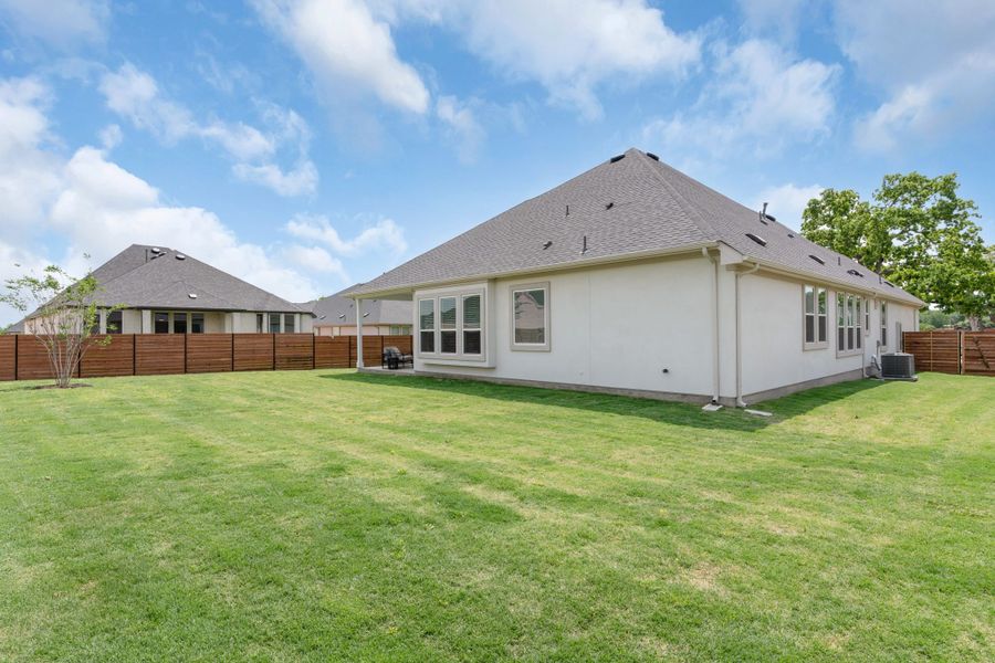 Exterior details and patio area of a home in Broken Oak, Georgetown (Image 43).