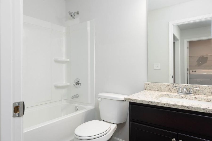 Furnished interior view inside a new home in , Suwanee (Image 8).