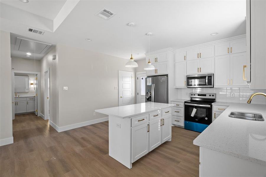 Full kitchen view with full appliances