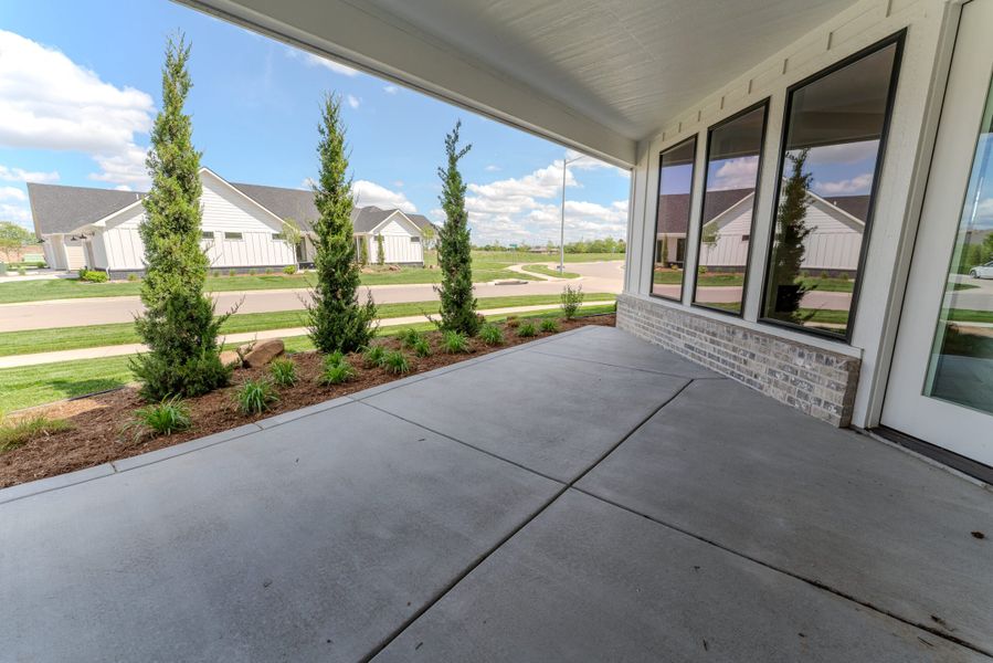 Exterior details and patio area of a home in The Courtyards at The Moorings, Wichita (Image 2). Exterior details and patio area of a home in The Courtyards at The Moorings, Wichita (Image 2).
