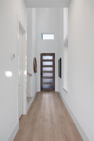 Soaring ceilings in the entry way welcome you home. Soaring ceilings in the entry way welcome you home.