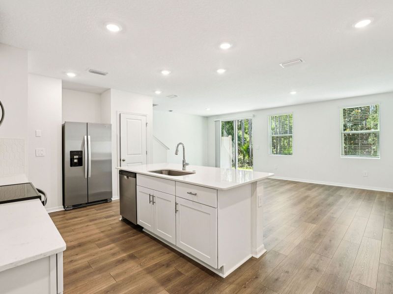 Furnished interior view inside a new home in Bradford Park, Ormond Beach (Image 5).