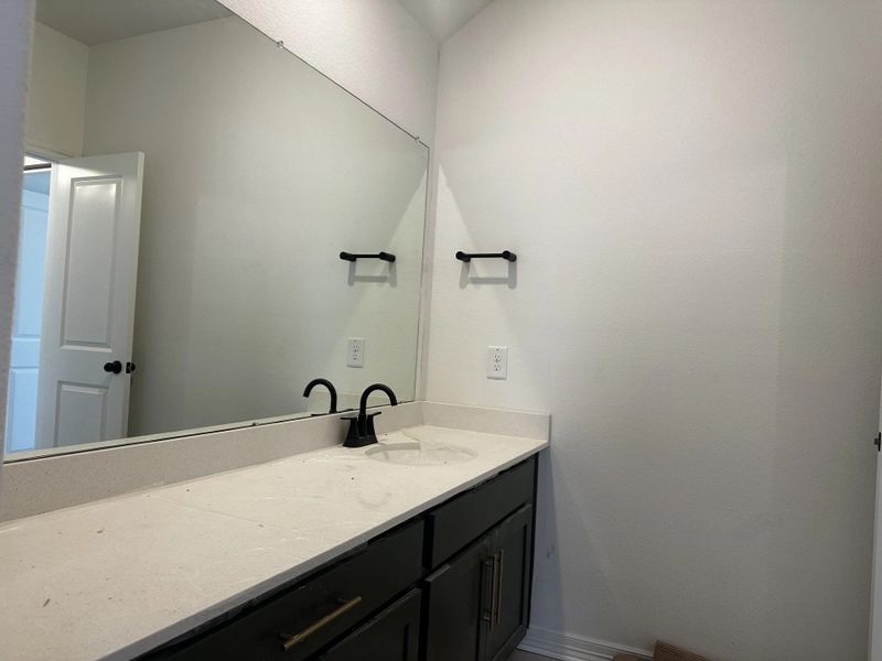 Furnished interior view inside a new home in Sunterra, Katy (Image 6).