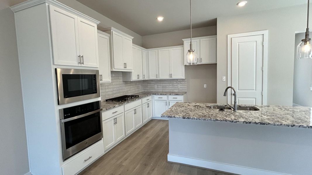 Furnished interior view inside a new home in Two Step Farm - Symphony Collection, Montgomery (Image 8).