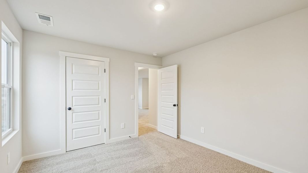 Representative unfurnished interior of a home built from the Dijon B by D.R. Horton in Harvest Point, Spring Hill (Image 40). Representative unfurnished interior of a home built from the Dijon B by D.R. Horton in Harvest Point, Spring Hill (Image 40).