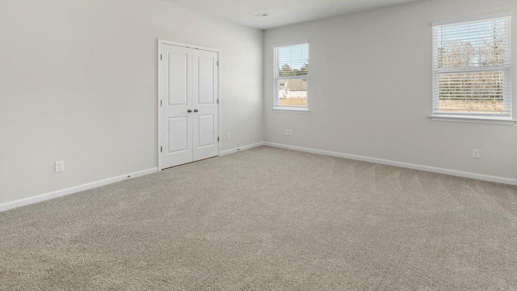 Spacious, unfurnished interior of a new home in The Preserve at Tidewater, Sneads Ferry (Image 21).