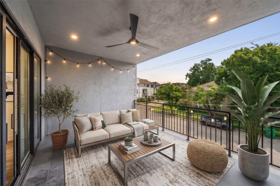 Virtually Staged - Expansive covered balcony with a ceiling fan and recessed lighting, ideal for relaxing and entertaining. Virtually Staged - Expansive covered balcony with a ceiling fan and recessed lighting, ideal for relaxing and entertaining.
