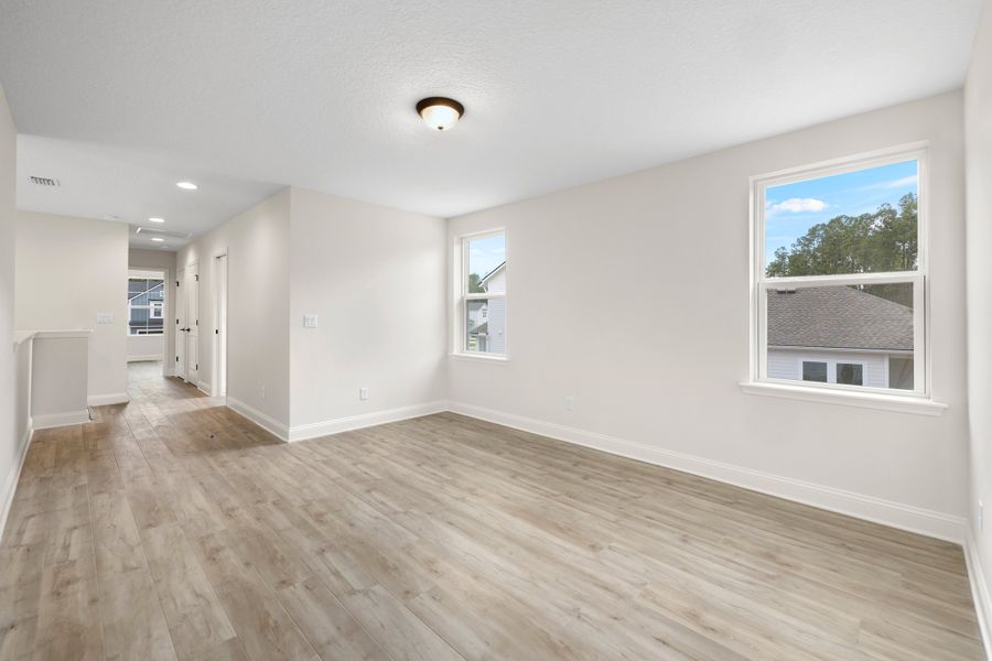 Representative unfurnished interior of a home built from the Palmetto by Riverside Homes in Mariposa at EverRange 40' Series, Jacksonville (Image 113).