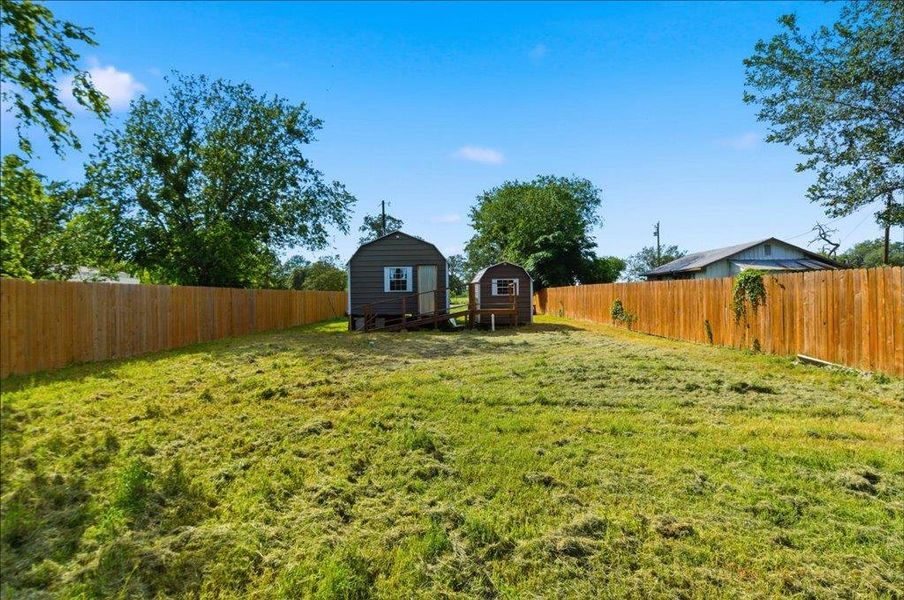 3 side fenced backyard space and includes a back patio deck.