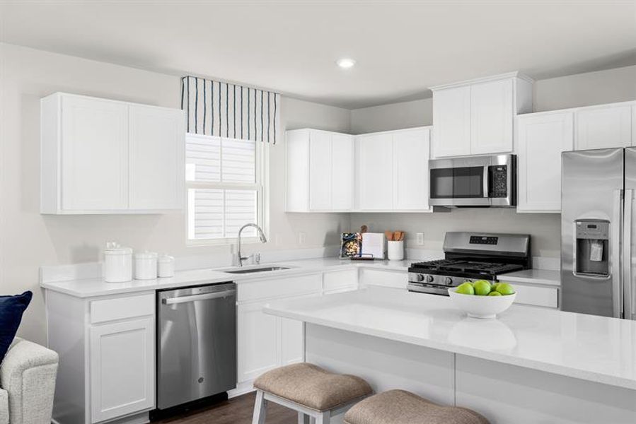Representative furnished interior of a home built from the Ellis by Ryan Homes in Middle Creek Village Coastal Cottages & Villas, Bolivia (Image 6).