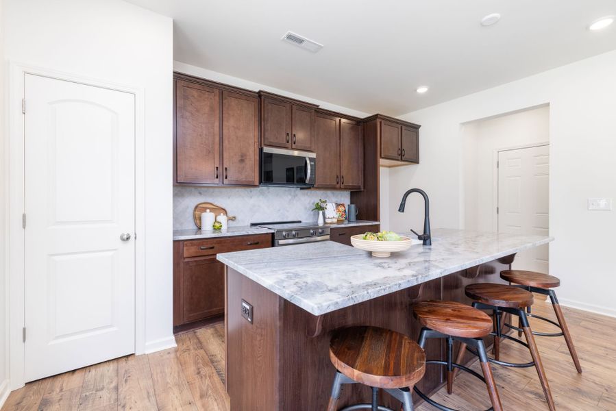 Furnished interior view inside a new home in Tanglewood East, Angier (Image 5). Furnished interior view inside a new home in Tanglewood East, Angier (Image 5).