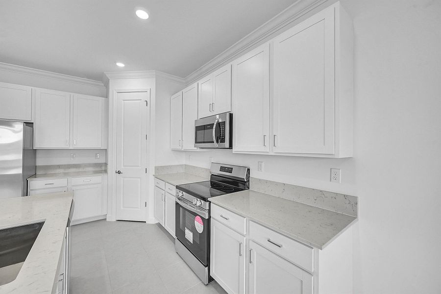 Furnished interior view inside a new home in Seagrove: The Indies, Fort Pierce (Image 6).