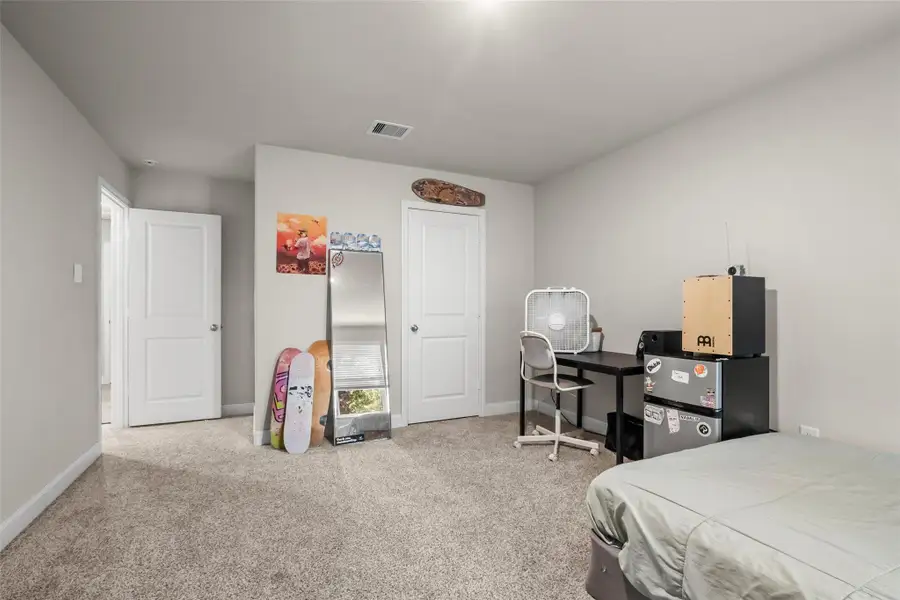 Furnished interior view inside a new home in , Conroe (Image 29).