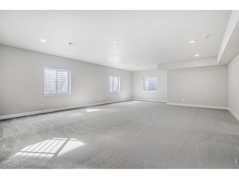 Spacious, unfurnished interior of a new home in RainDance, Windsor (Image 23).