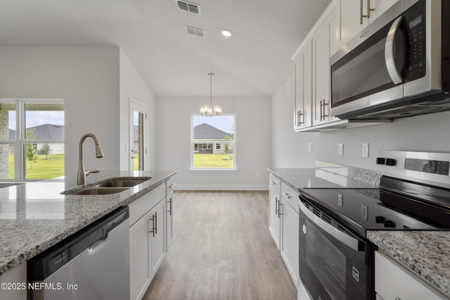 Furnished interior view inside a new home in Shadow Crest at Rolling Hills, Green Cove Springs (Image 4).