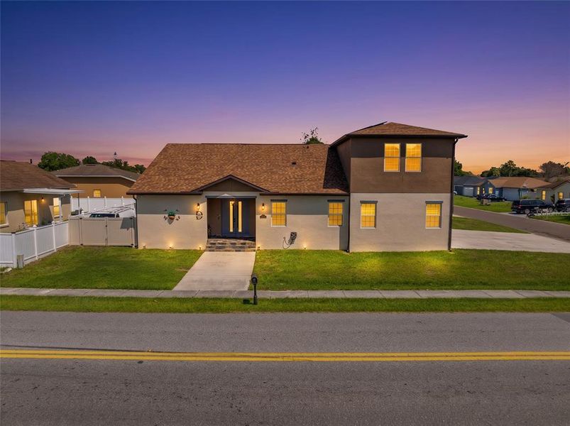 Front exterior of a new home in , Kissimmee, FL, highlighting curb appeal (Image 27). Front exterior of a new home in , Kissimmee, FL, highlighting curb appeal (Image 27).