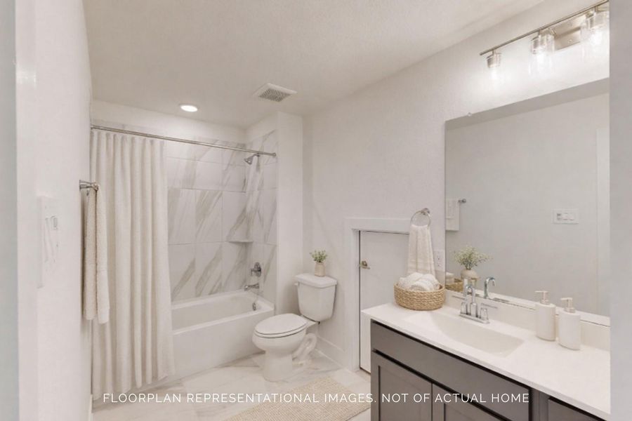 Furnished interior view inside a new home in Sorella, Tomball (Image 8). Furnished interior view inside a new home in Sorella, Tomball (Image 8).