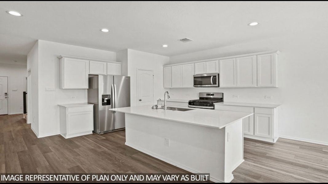 Representative furnished interior of a home built from the Midland by D.R. Horton in Sunterra, Katy (Image 8).