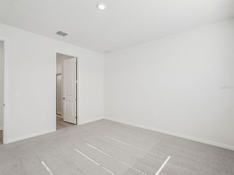 Spacious, unfurnished interior of a new home in Coasterra - Reserve Series, Palmetto (Image 24).