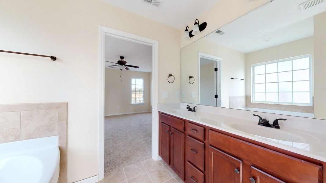 Representative furnished interior of a home built from the Rockbridge by Bill Clark Homes in Davenport Farms, Winterville (Image 7).