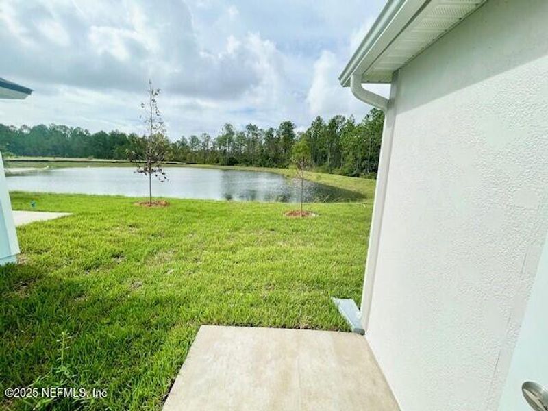 Exterior details and patio area of a home in Grand Reserve, Bunnell (Image 4).