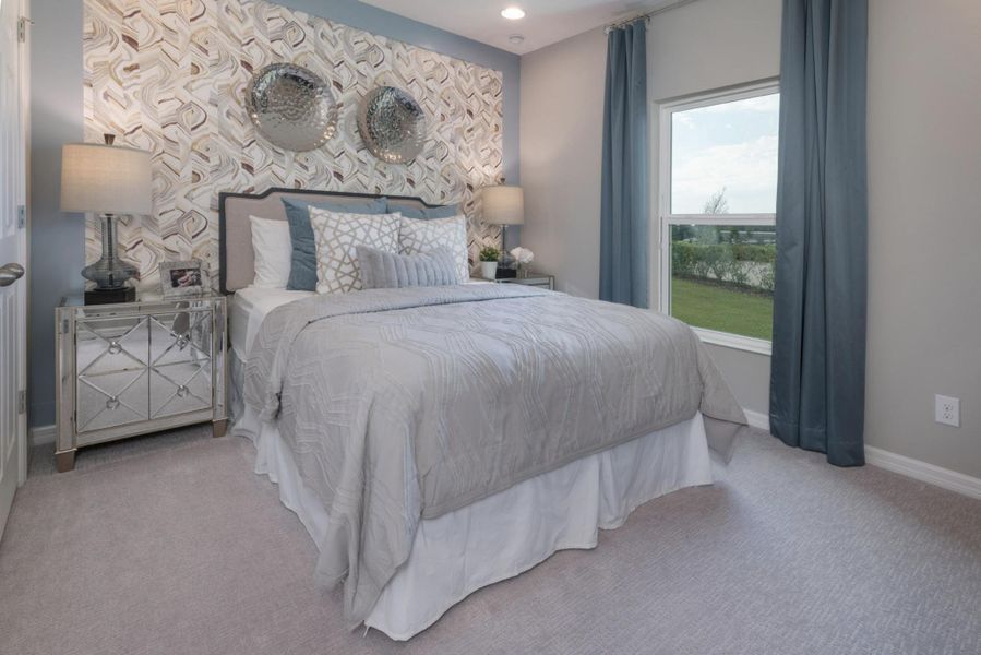 Representative furnished interior of a home built from the Kensington Flex by Risewell Homes in Park View at the Hills, Minneola (Image 14).
