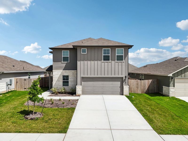 View of front facade with board and batten siding, stone siding, concrete driveway, an attached garage, and a shingled roof View of front facade with board and batten siding, stone siding, concrete driveway, an attached garage, and a shingled roof