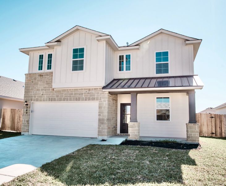 Representative exterior photo of a completed home built from the Townsquare by Steve Klein Custom Builder in TerraVista, Victoria, TX (Image 2). Representative exterior photo of a completed home built from the Townsquare by Steve Klein Custom Builder in TerraVista, Victoria, TX (Image 2).