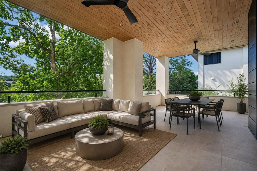 Virtually staged. Rich wood plank ceilings and large tile flooring define this sheltered outdoor living space. Virtually staged. Rich wood plank ceilings and large tile flooring define this sheltered outdoor living space.
