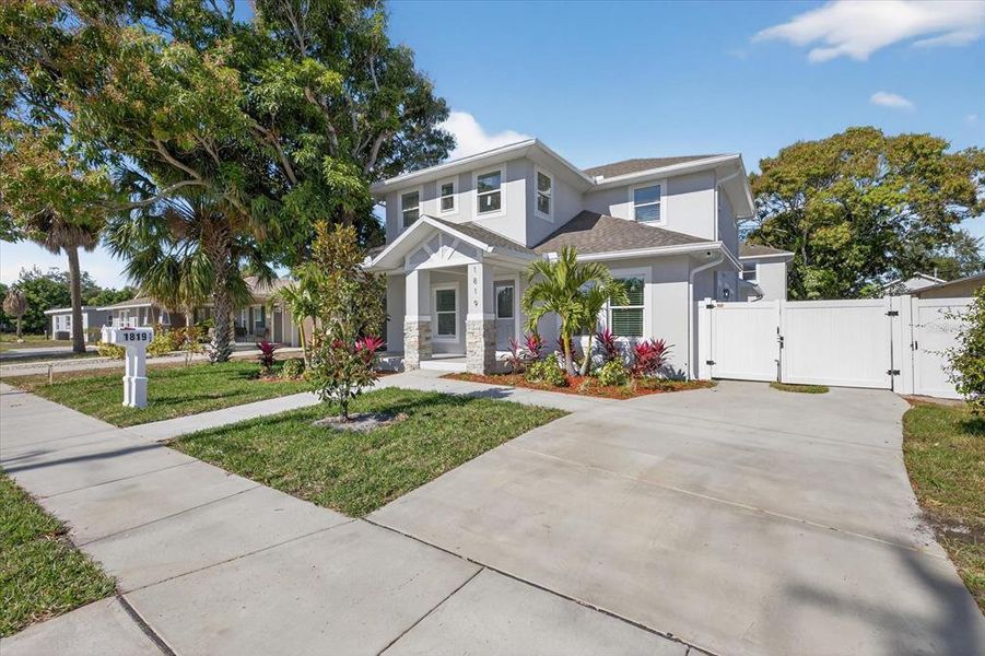 Front exterior of a new home in , St. Petersburg, FL, highlighting curb appeal (Image 30).