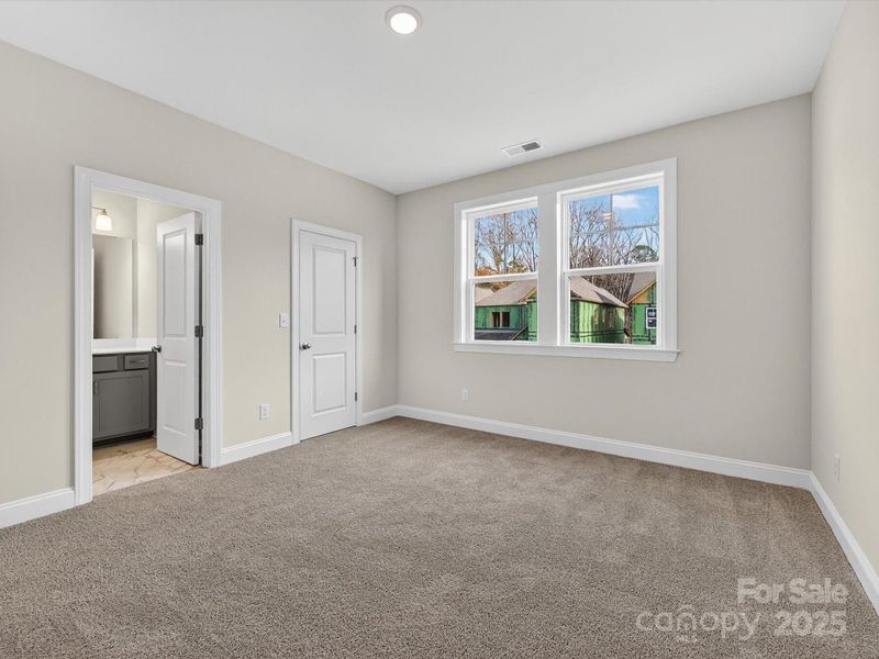 Spacious, unfurnished interior of a new home in North Creek Village, Huntersville (Image 36).