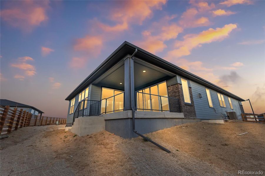 Exterior details and patio area of a home in The Aurora Highlands, Aurora (Image 20).
