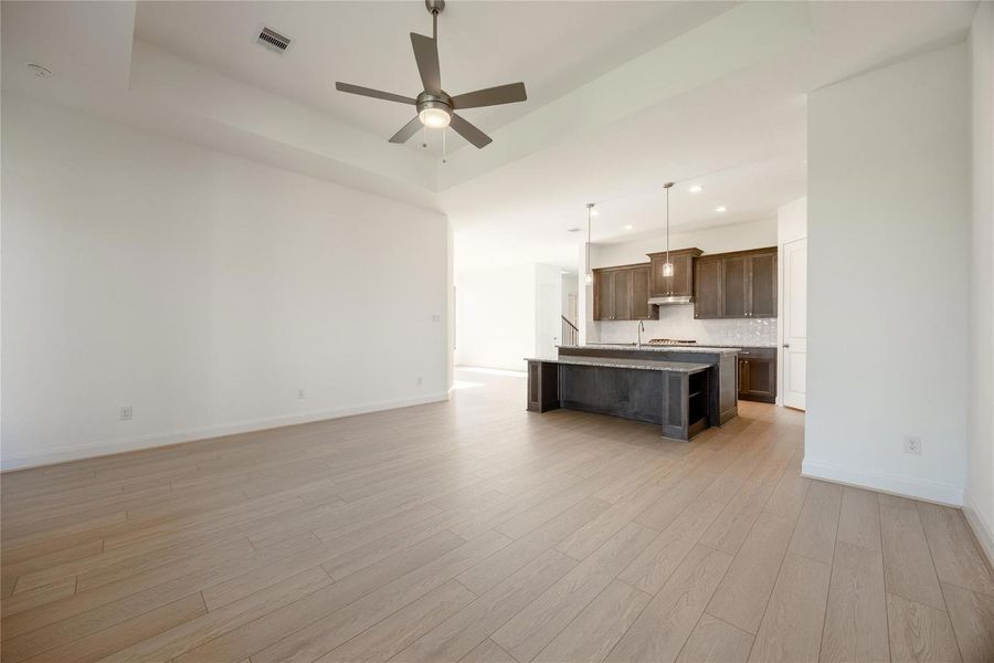 Open Concept Kitchen connecting to the dining and living area