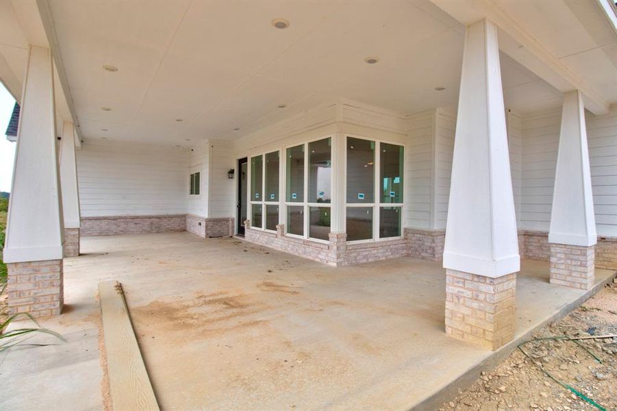 View of patio / terrace featuring an attached carport View of patio / terrace featuring an attached carport