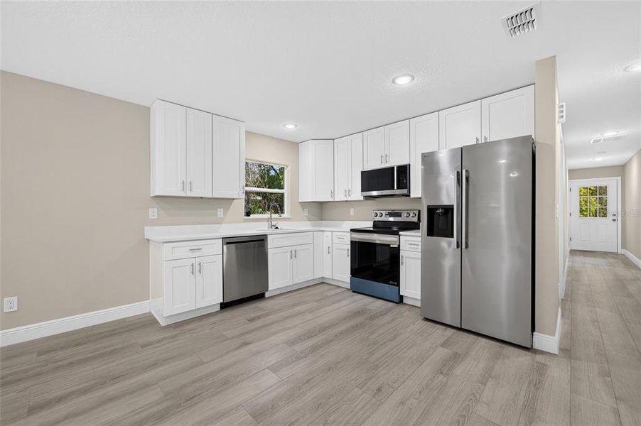 Furnished interior view inside a new home in , Orange City (Image 5).
