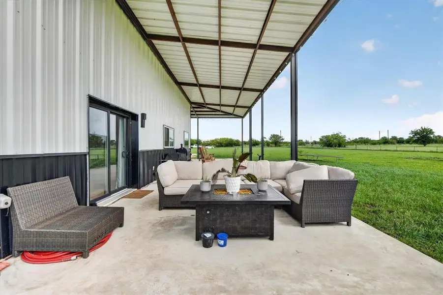 Exterior details and patio area of a home in , Ponder (Image 23).